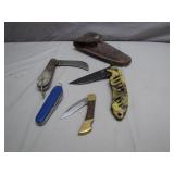 Four Folding Knives with Leather Sheath