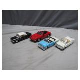 Four 1:43 Scale Diecast Cars