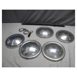 Five Hubcaps With Vintage Accessories