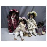 Four Early 20th-Century Porcelain Dolls