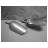 Two Metal Scoops With Engraved Details