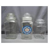 Three Glass Storage Jars With Lids
