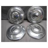 Four Jaguar Branded Hubcaps