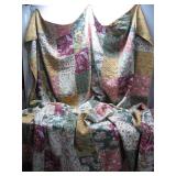 Handcrafted Patchwork Quilt With Floral Patterns