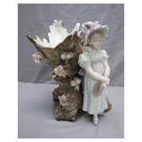 Porcelain Figurine With Floral Tree Stump Vase