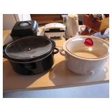Two Rival Crock-Pot Slow Cookers
