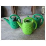 Three Green Plastic Watering Cans