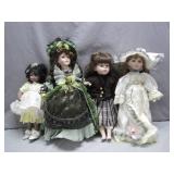 Four Porcelain Dolls in Period Attire