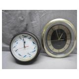 Two Wall Clocks Featuring Birds and Roman Numerals