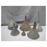 Seven Assorted Metal Funnels