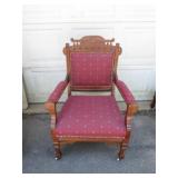 Ornate Wooden Armchair With Red Upholstery