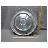 Three 1957 Dodge Hubcaps