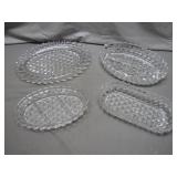 Four Pressed Glass Serving Trays