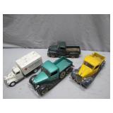 Four Diecast Collectible Trucks