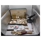 Eclectic Collection of Metal Trinkets and Jewelry