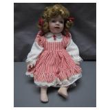 Porcelain Doll in Red and White Dress