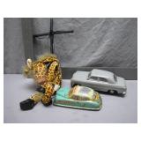 Two Toy Cars and Giraffe Puppet