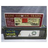 Two Holiday-Themed Train Box Cars