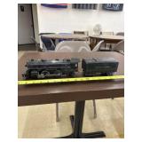 Lionel 1654 Locomotive and metal whistle tender