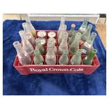Vintage bottles,cans,and royal crown cola carrier