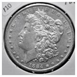 1884 MORGAN DOLLAR AU