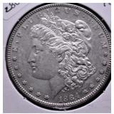 1884 MORGAN DOLLAR AU