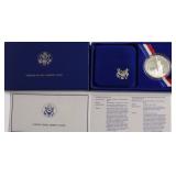 PROOF ELLIS ISLAND SILVER DOLLAR W BOX PAPERS