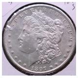 1897 S MORGAN DOLLAR AU