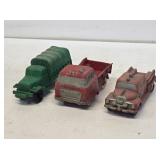 3 Early Auburn Rubber Truck Toys