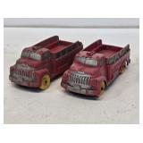 2 Early Auburn Rubber Fire Truck Toys