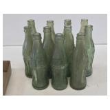 11 Coca-Cola Blue Glass Bottles