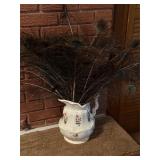 Vintage pitcher and peacock feathers
