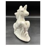Vintage iridescent unicorn figure