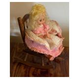 Vintage crochet doll in rocking chair