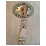 Oval mirror & vintage wicker towel holder
