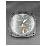 aviation-themed clock resembles aircraft altimeter