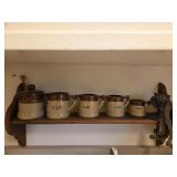 Vintage pottery measuring cups and grinder