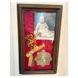 Antique shadow box with baby photographs