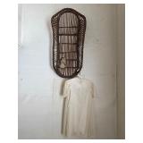 Antique baby wicker basket and baby gown dress