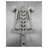 vintage Wilton cast iron trivet
