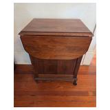 Drop leaf cabinet