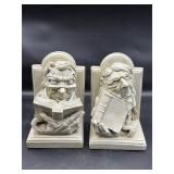 vintage bookend featuring a man reading a book