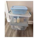 3 totes 2- empty 1- w/ bathroom cleaning supplies