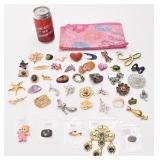 Lot de broches, dont Monet, Avon,
