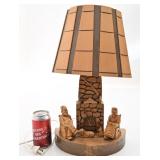 Lampe en bois sculpté, signée Berthier