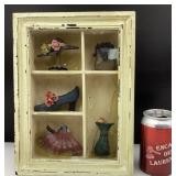 Diorama avec articles féminins