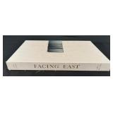 Facing East Signed