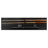 Collection of Pool Cue Sticks