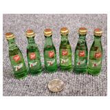 6) Miniature 7-Up Bottles