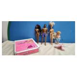 4) Dolls and a Barbie Case